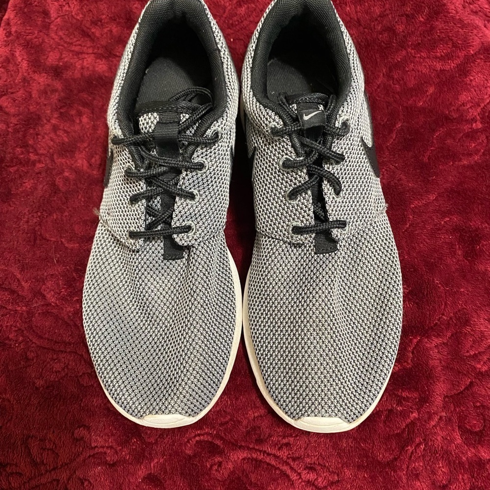 Nike Black and Gray Athletic Shoes
Size 7Y  or 8.5 in women’s. In great shape!